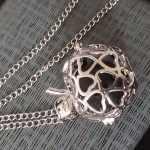 Aromatic apple locket charm with a sent stone dip ball in your favorite flavor.